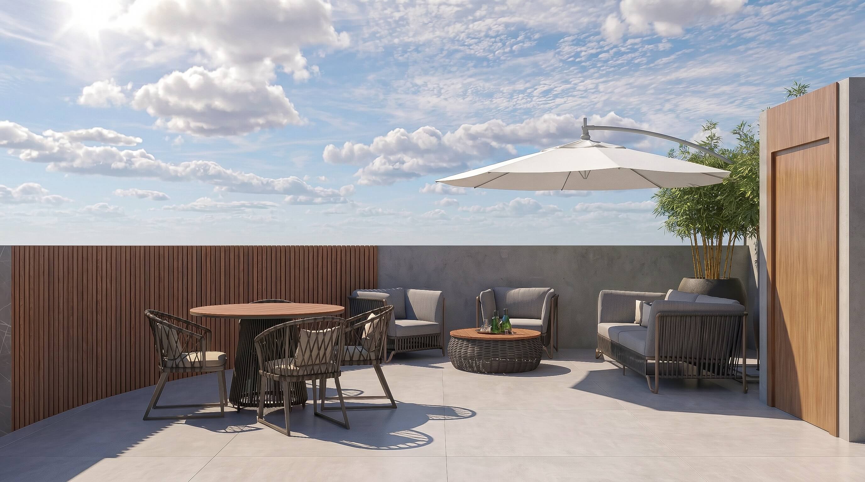 Terraço aberto da residência com mobiliário, madeira e vista para o céu